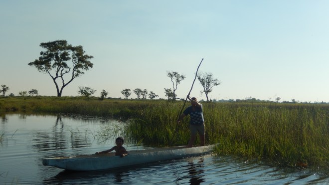 Carrie learning to pole with Hayden instructing