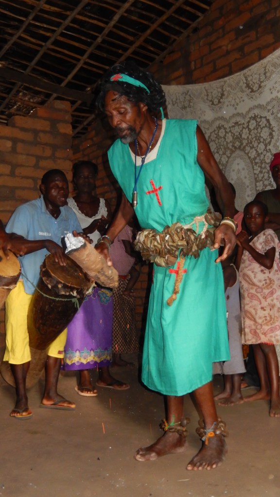 Witch doctor eating fire