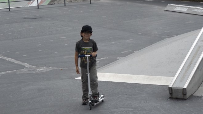 Scooter riding at the skate park